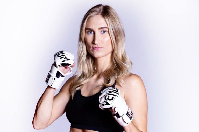 Colbey Northcutt poses in Venum gloves