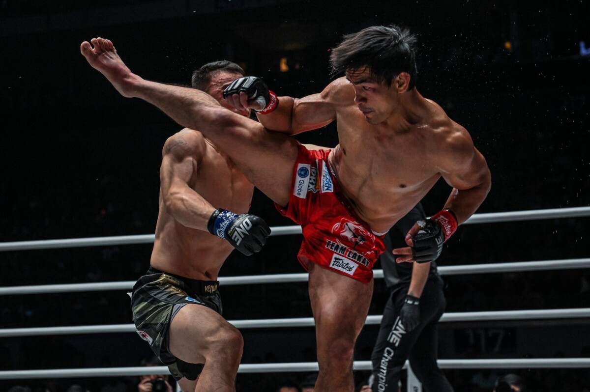 Filipino MMA fighter Eduard Folayang launches a spinning heel hook