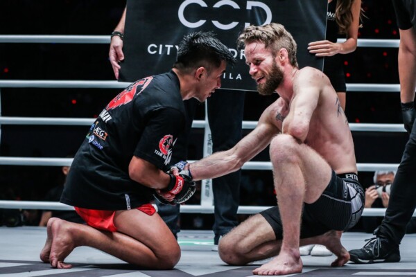 Geje Eustaquio shows his respect to Toni Tauru