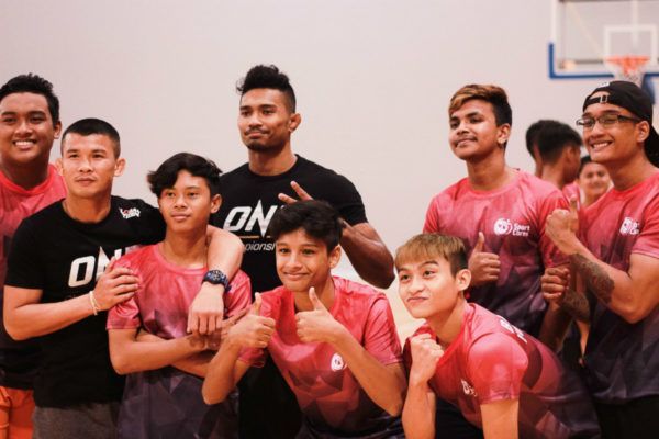 ONE Bantamweight Muay Thai World Champion Nong-O Gaiyanghadao and Amir Khan pose for a picture during a workshop