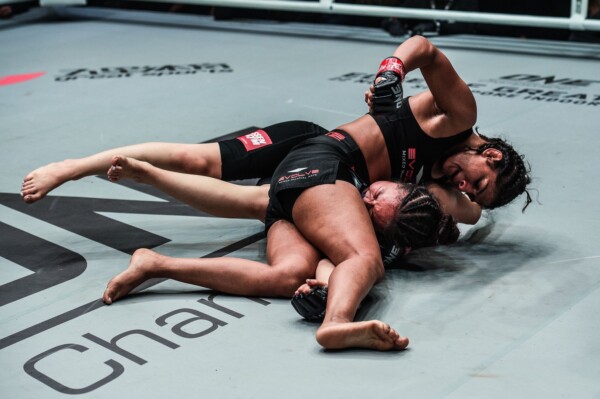 India's Ritu Phogat pounds away at Nam Hee Kim in her debut in November 2019