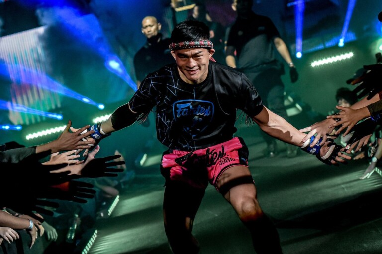 Muay Thai fighter Saemapetch Fairtex walks into the Singapore Indoor Stadium