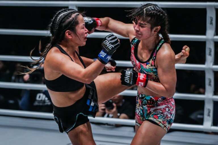 Stamp Fairtex lands a cross on Bi Nguyen