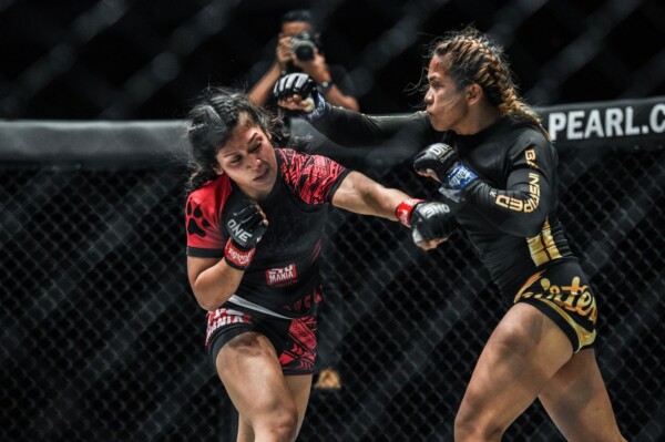 Denice Zamboanga sidesteps Jihin Radzuan and connects with a punch