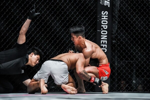 South Korea's Yoon Chang Min submits Rodian Menchavez with a ninja choke