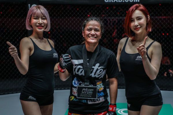 Gina Iniong celebrates her win against Asha Roka at ONE FIRE & FURY