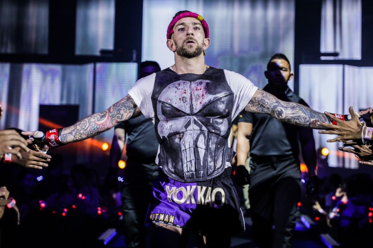 British Muay Thai World Champion Liam Harrison walks to the ring in his punisher shirt