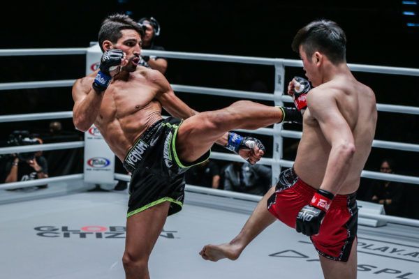 French-Algerian star Mehdi Zatout hits Chinese striker Han Zi Hao with a roundhouse kick