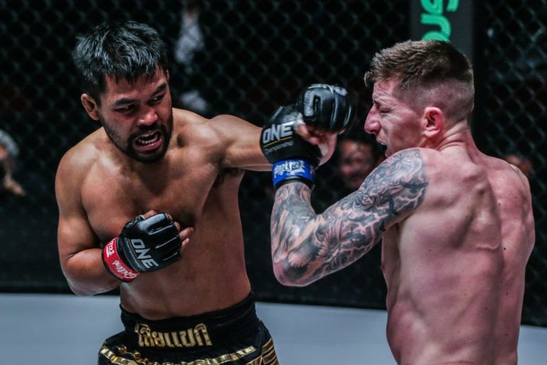 Thailand's Rodlek PK.Saenchaimuaythaigym and Scotland's Chris Shaw compete in ONE Championship