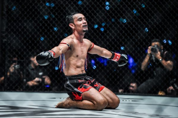 ONE Strawweight Kickboxing World Champion Sam-A Gaiyanghadao celebrates his win against Wang Junguang
