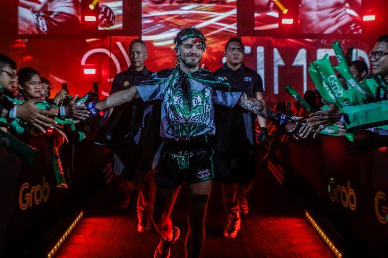 Josh Tonna walks to the ring for battle in Jakarta, Indonesia