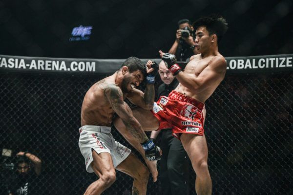 ONE Strawweight World Champion Joshua Pacio catches Alex Silva with a knee