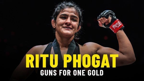Ritu "The Indian Tigress" Phogat flexes following her first professional victory at ONE: AGE OF DRAGONS.