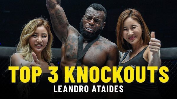 Leoandro Ataides raises his hand in victory after a stunning knockout performance.