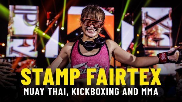 Thailand's Stamp Fairtex is all smiles as she walks down the ramp to perform in front of adoring fans on the global stage.