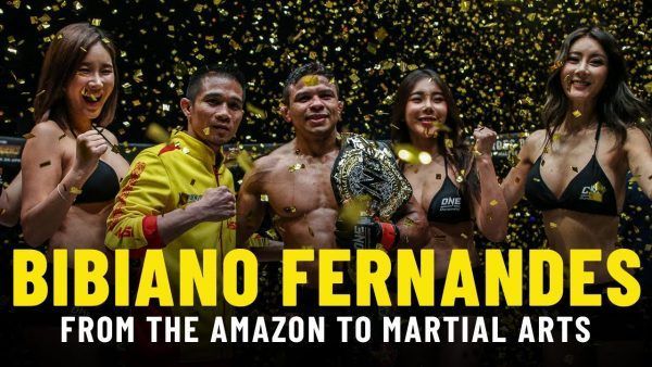 Confetti falls as Bibiano Fernandes poses with his ONE Bantamweight World Championship.