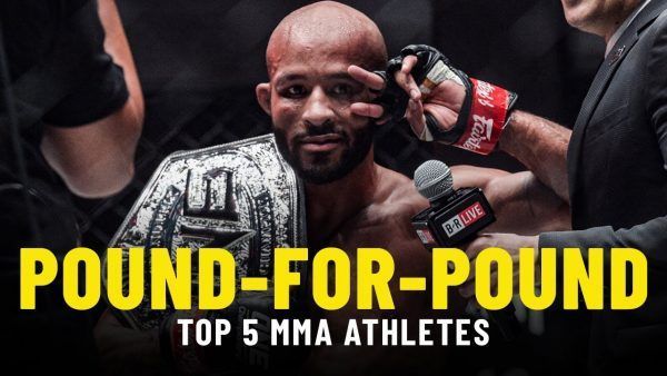 Demetrious Johnson celebrates his ONE Championship Flyweight World Grand Prix victory at ONE: CENTURY.