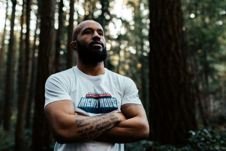 Demetrious Johnson models his new shirt from the ONE.Shop!