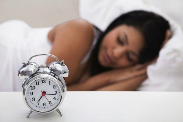 Person sleeping in bed