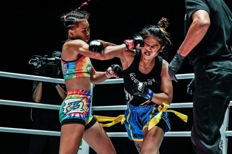 Muay Thai fighter Wondergirl Fairtex lands a punch on KC Carlos