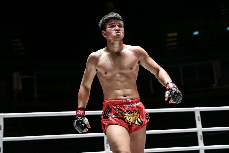 Muay Thai fighter Pongsiri PK.Saenchai Muaythaigym walks away, feeling triumphant