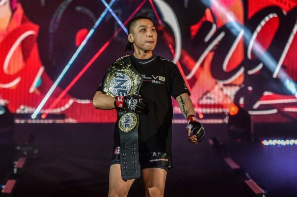 Chinese MMA fighter Xiong Jing Nan walks to the Circle with her ONE Championship belt