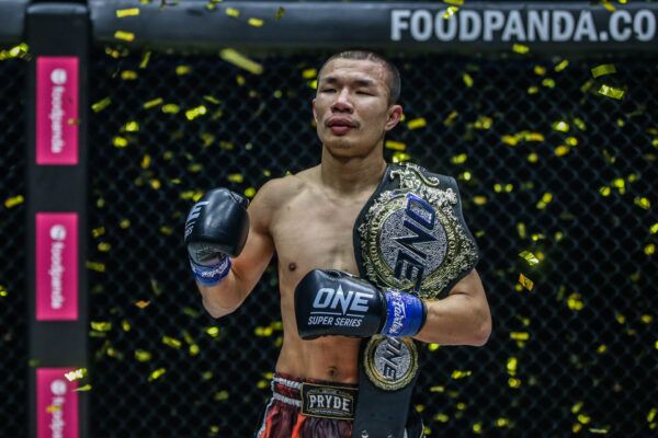 Capitan Petchyindee Academy with the ONE Championship belt