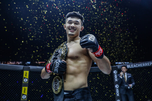 MMA fighter Christian Lee with the ONE Championship belt