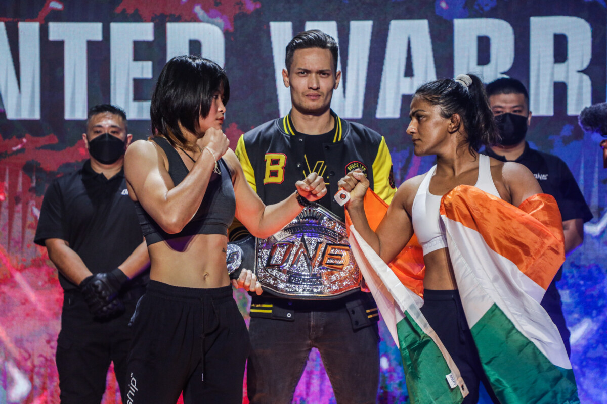 MMA fighter Stamp Fairtex stares down Ritu Phogat before their match at ONE: WINTER WARRIORS
