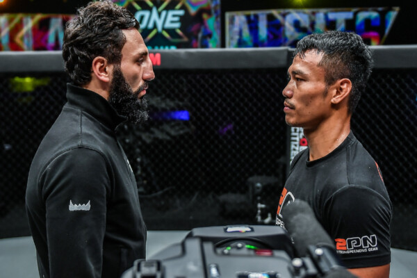 Sitthichai Sitsongpeenong and Davit Kiria stare each other down at the end of ONE: ONLY THE BRAVE.