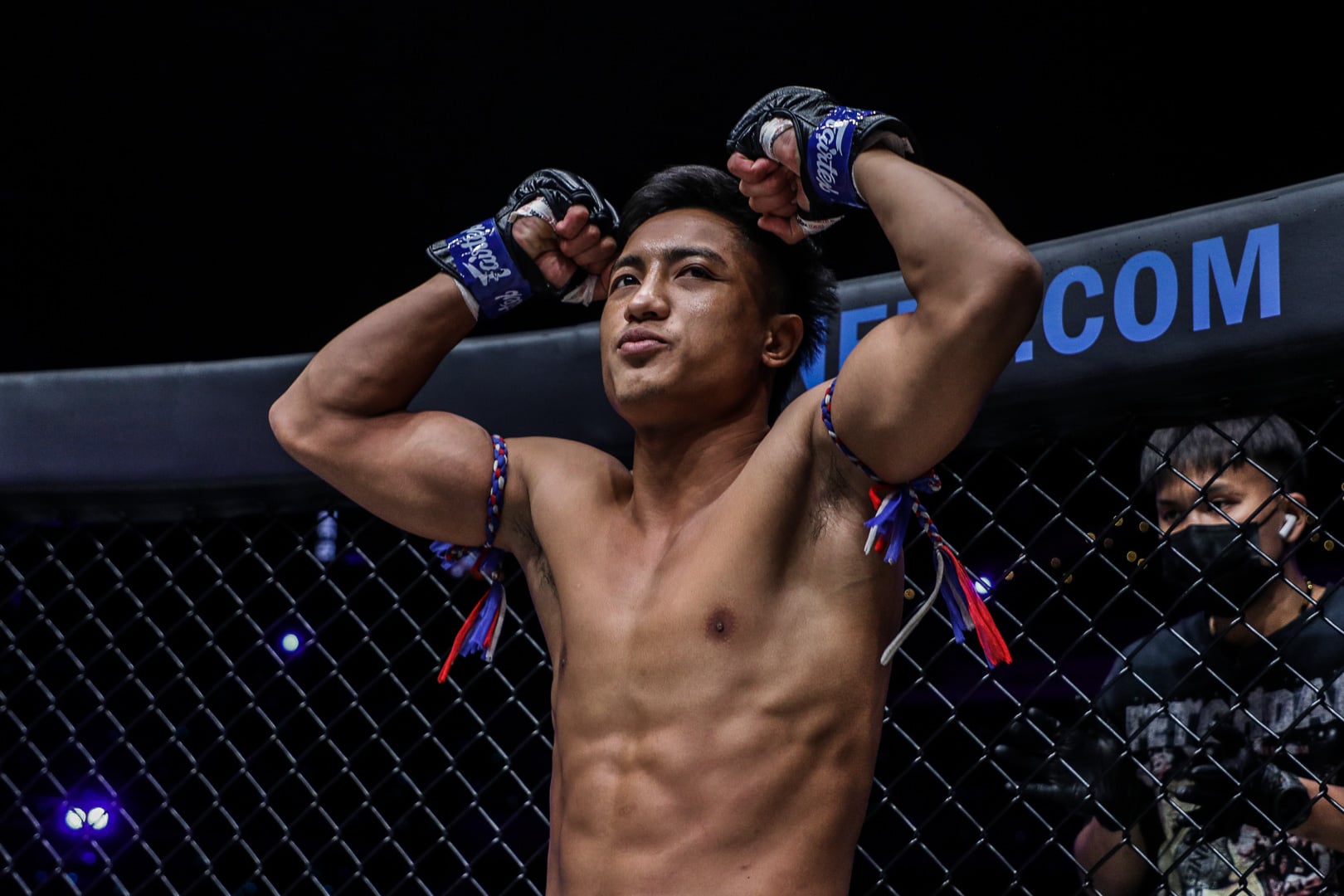 Mongkoldetlek Por Pim-on flexes before his match at ONE: BAD BLOOD.