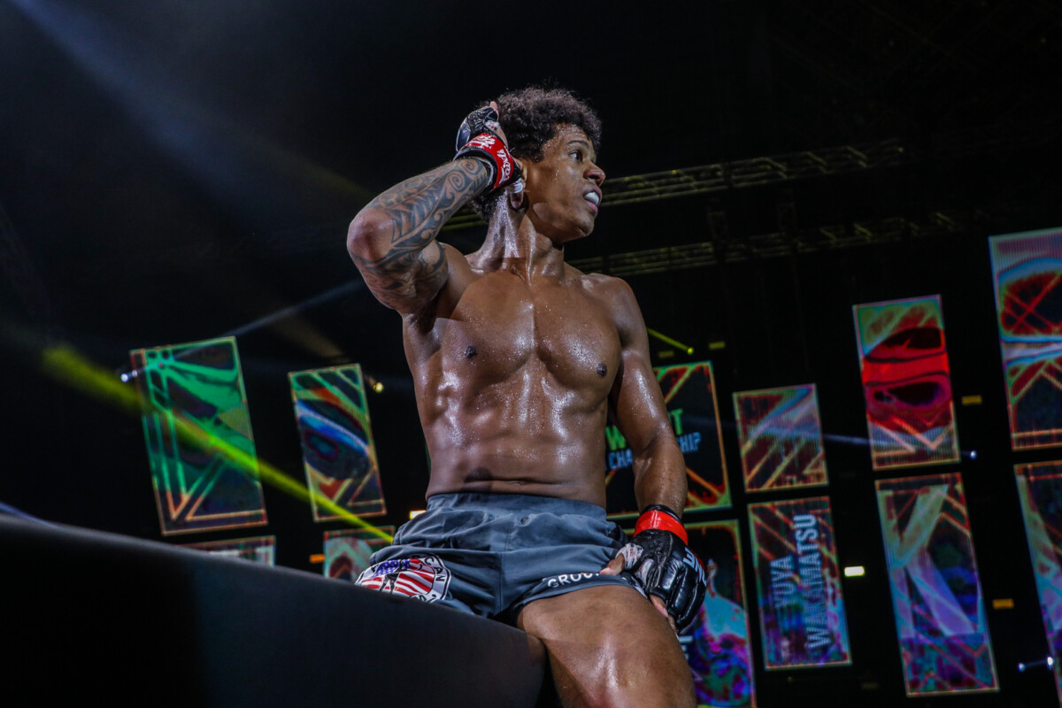 Adriano Moraes celebrates his successful defense of the ONE Lightweight World Championship at ONE X