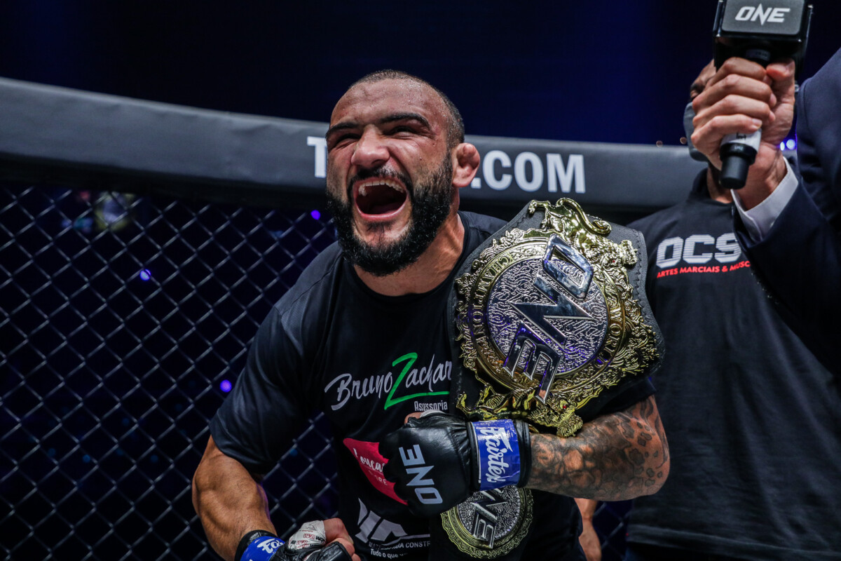Brazilian MMA fighter John Lineker poses with his newly won ONE Bantamweight World Title at ONE: LIGHTS OUT