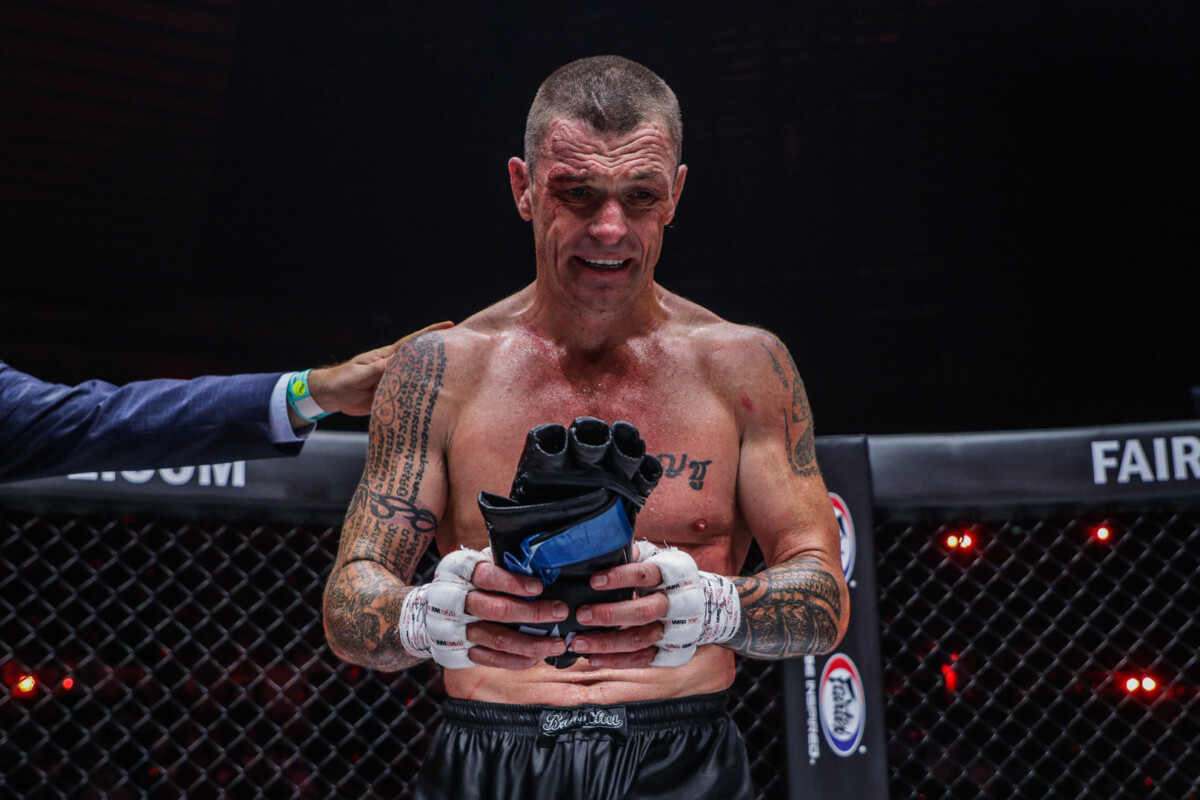 John Wayne Parr leaves his gloves in the Circle after his retirement fight at ONE X