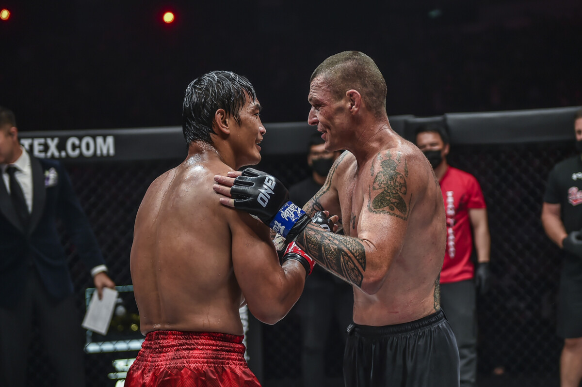 Eduard Folayang and John Wayne Parr show respect for one another after their lightweight Muay Thai showdown at ONE X