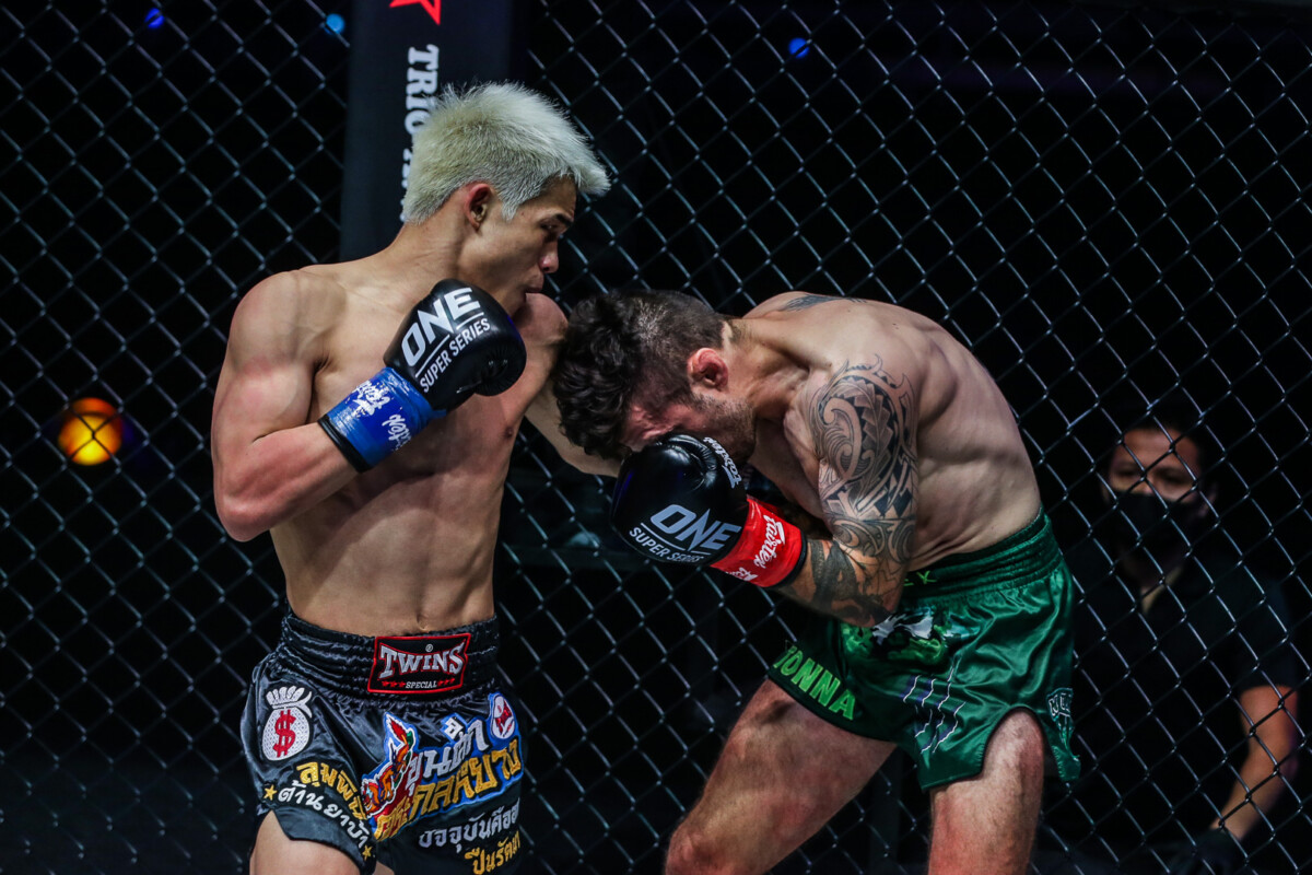 Zhang Peimian rocks Josh Tonna with a punch during their fight at ONE: LIGHTS OUT