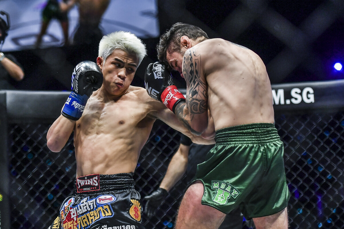 Zhang Peimian punishes Josh Tonna with a punch during their fight at ONE: LIGHTS OUT