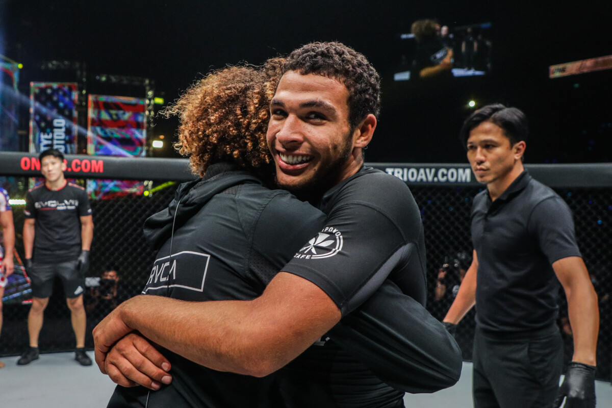 Tye Ruotolo embraces brother Kade Ruotolo at ONE 157