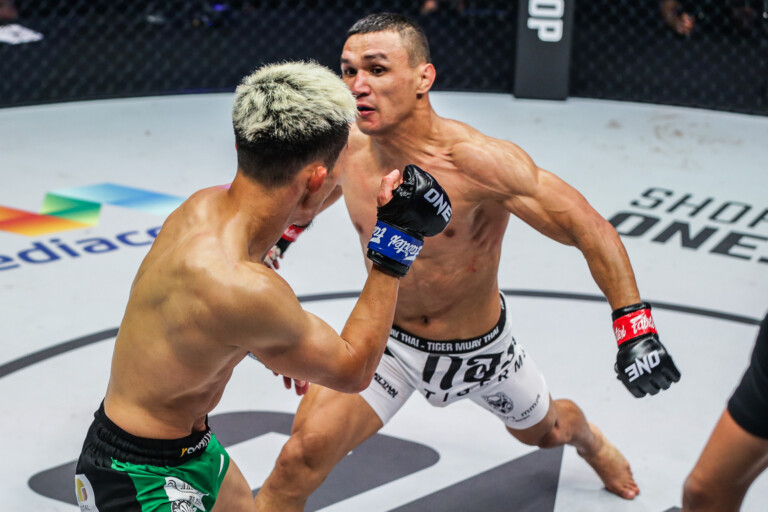 Kairat Akhmetov lunges at Tatsumitsu Wada at ONE 158