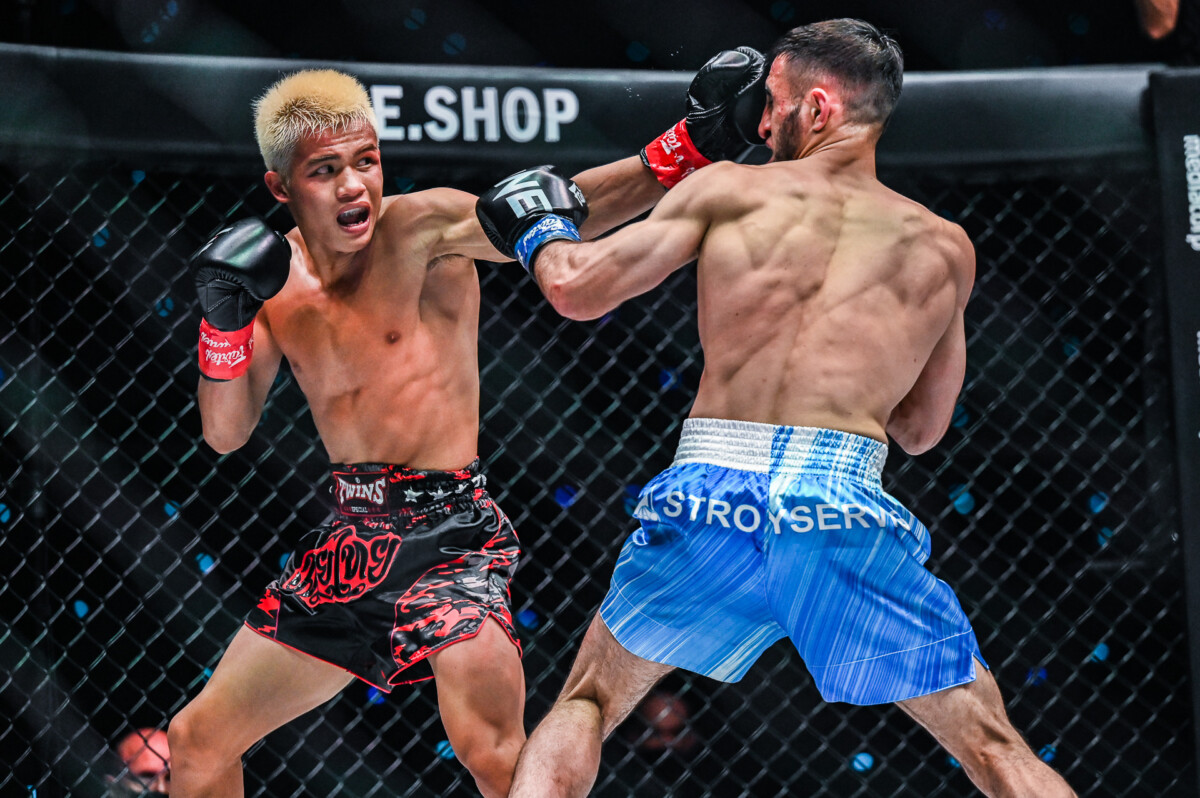 Zhang Peimian lands a punch on Aslanbek Zikreev at ONE 159