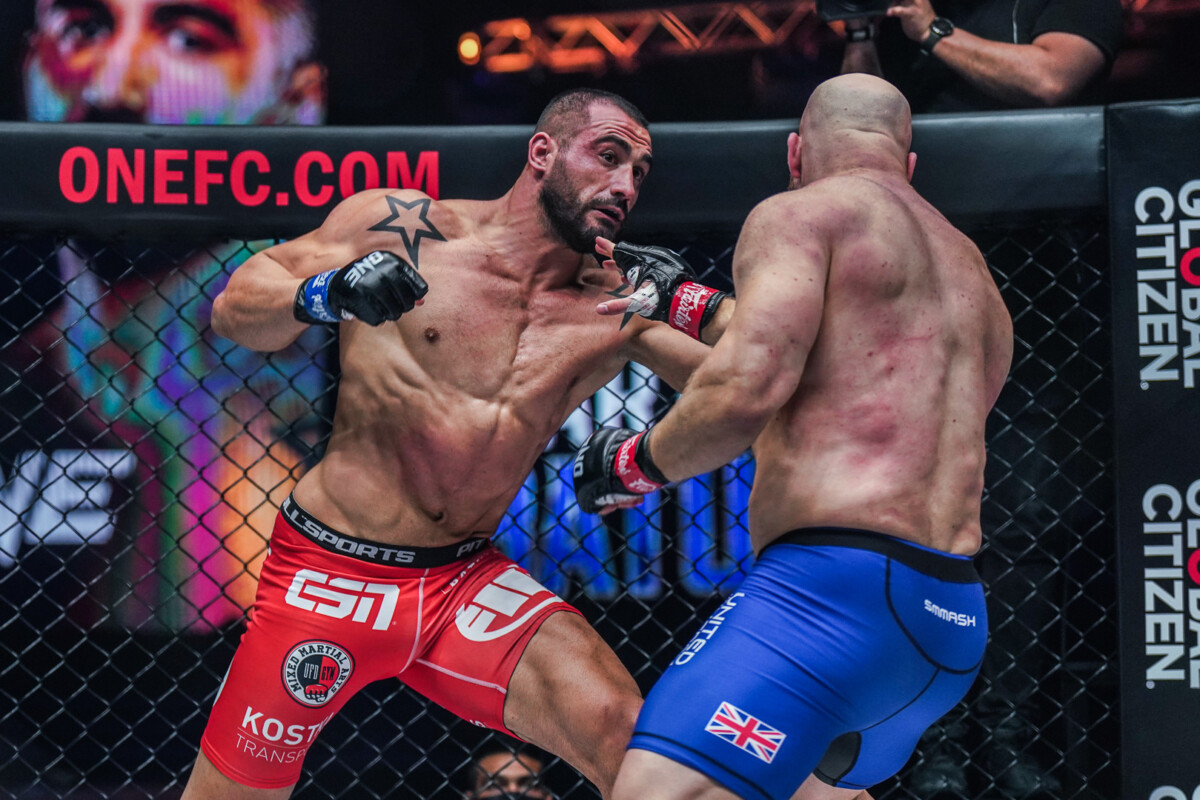 Croatian MMA fighter Martin Batur punches Paul Elliott