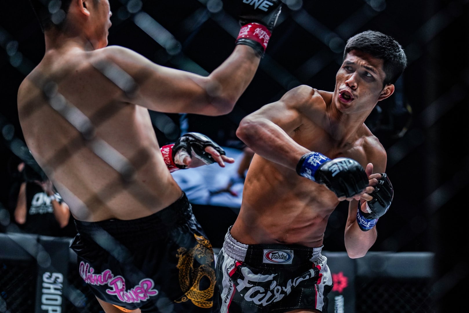 Ferrari Fairtex swings at Han Zi Hao at ONE 161.