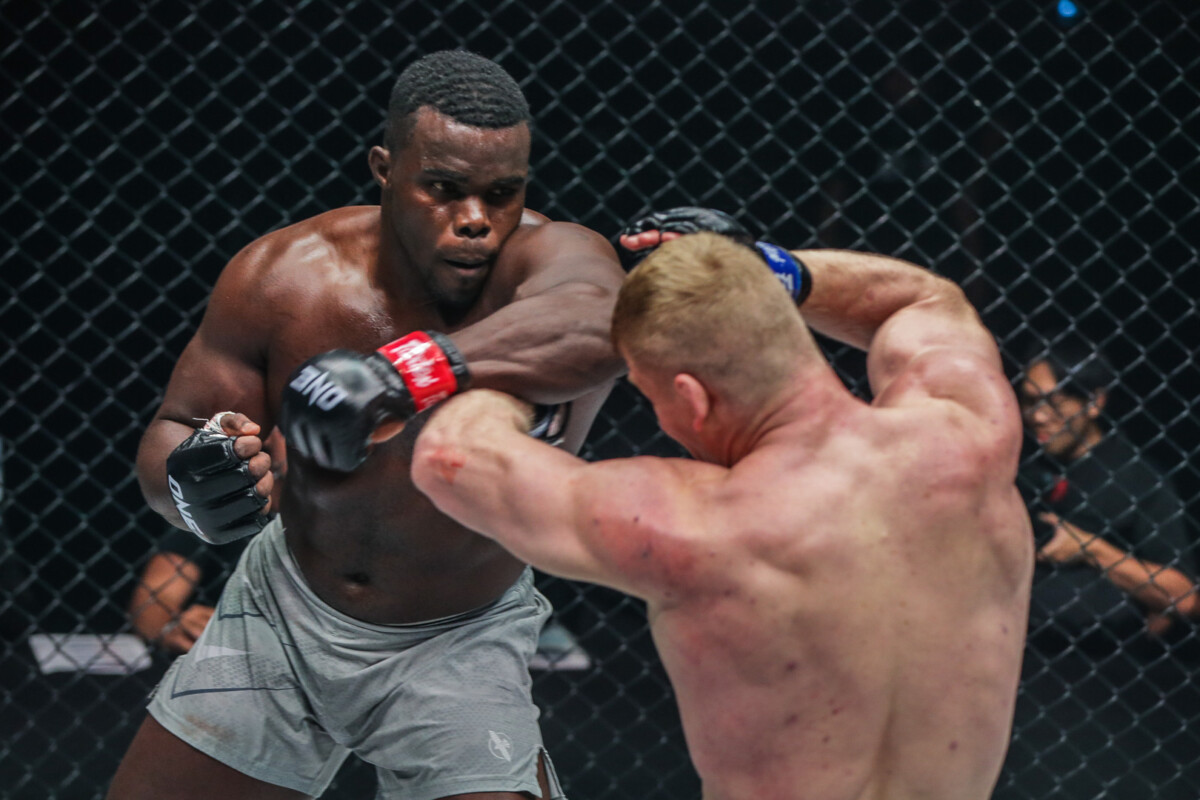Oumar Kane swings a punch at Batradz Gazzaev at ONE 161