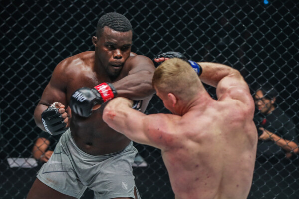 Oumar Kane swings a punch at Batradz Gazzaev at ONE 161