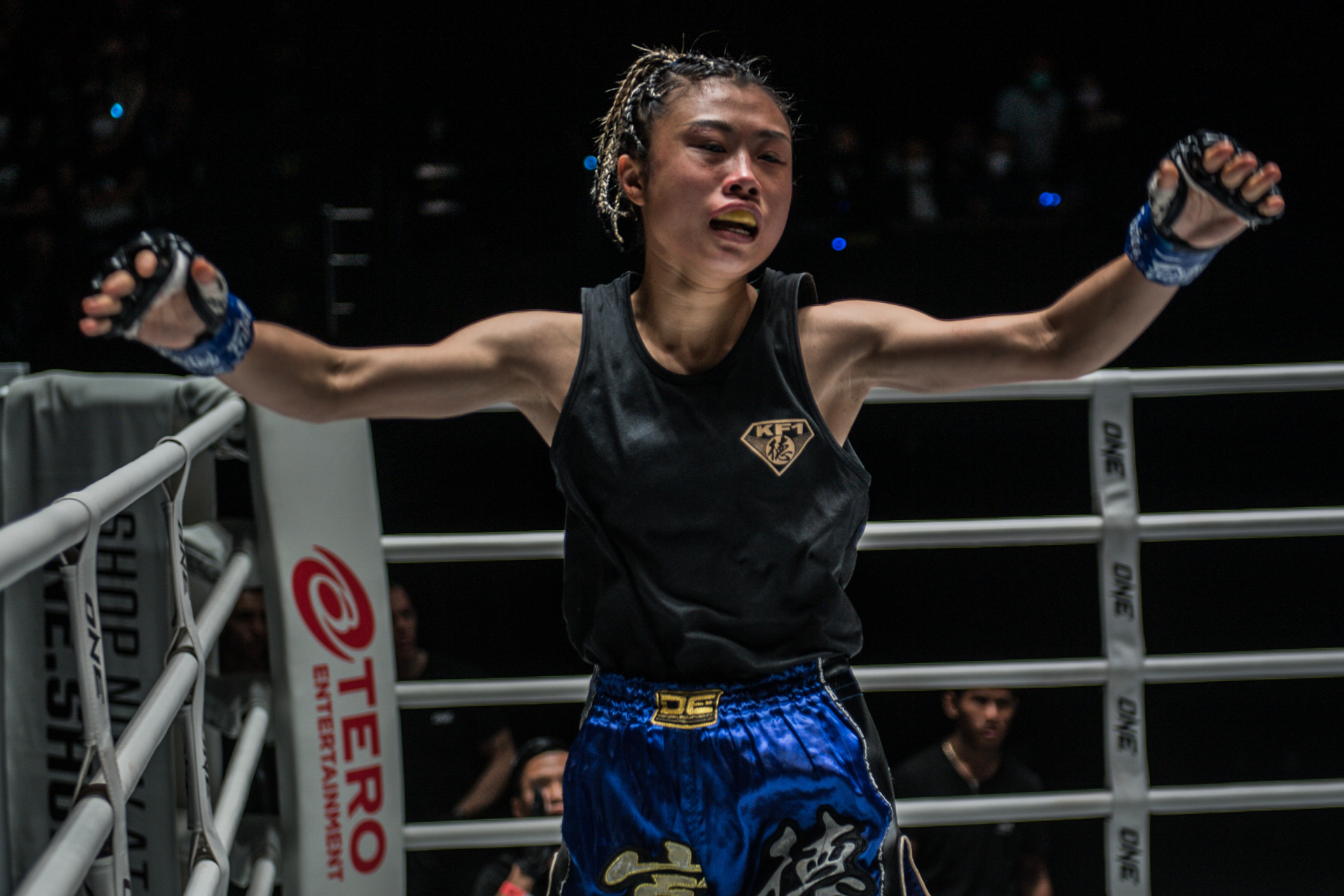 Muay Thai star Yu Yau Pui celebrates in the ring