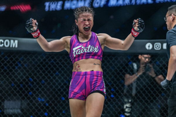 Stamp Fairtex celebrates her victory in the cage