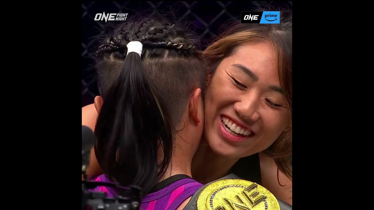 Angela Lee passes the torch to Stamp Fairtex