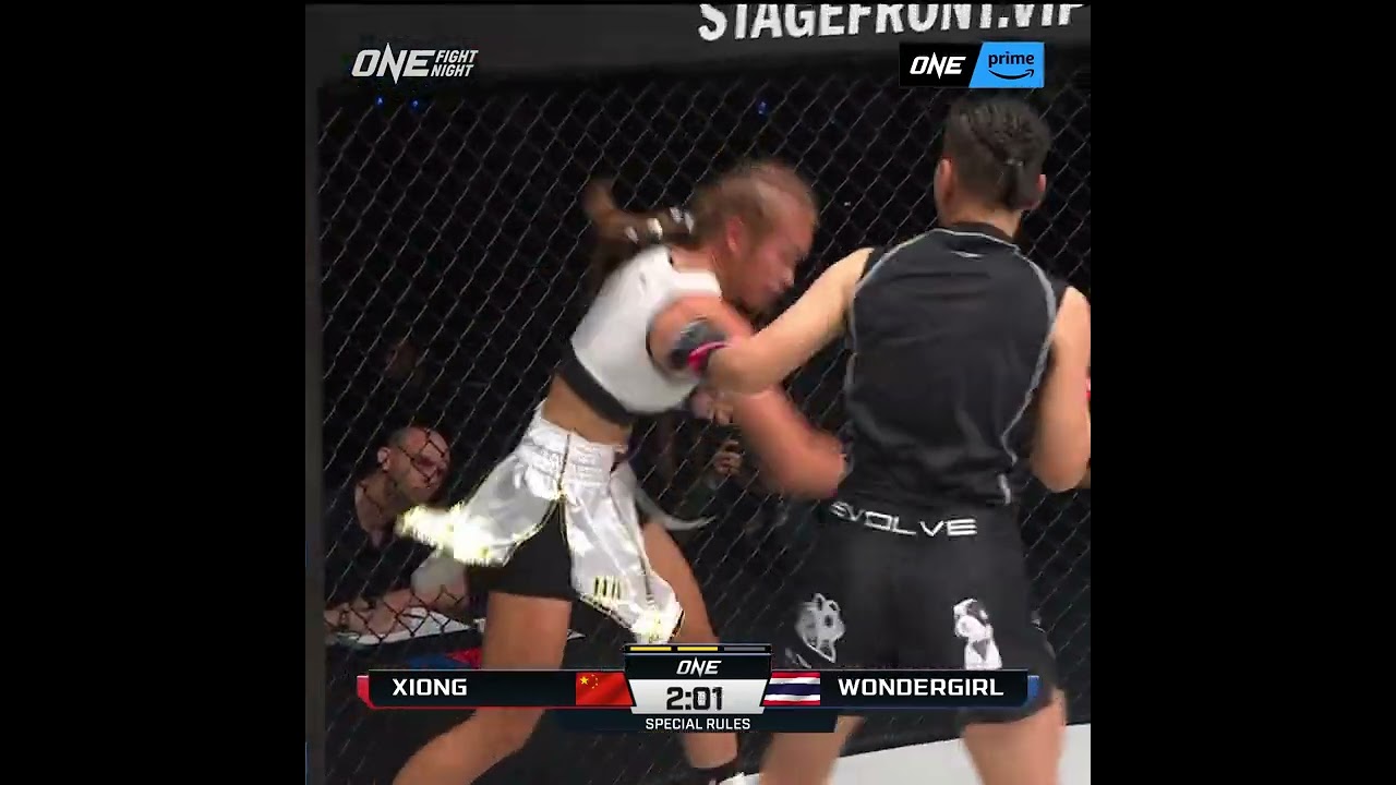Xiong Jing Nan  tees off on Wondergirl for the TKO in their special rules striking match!