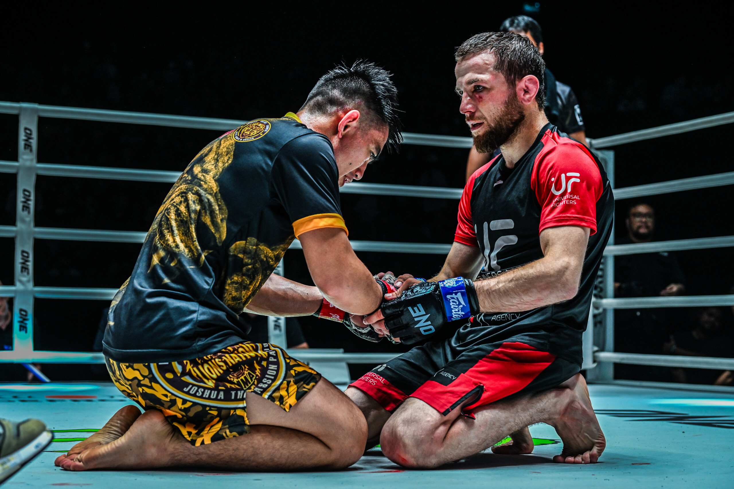 Joshua Pacio and Mansur Malachiev share a moment after their ONE Fight Night 15 battle.