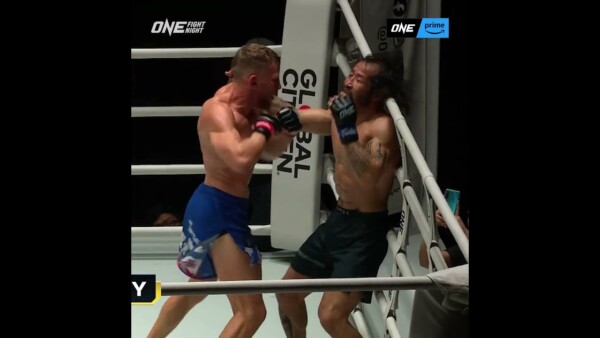 BLAST OFF  Artem Belakh lands a flying knee and elbows for the TKO!